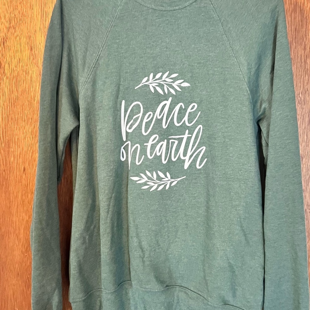 Bella Canvas Green Crewneck Sweatshirt with White "Peace on Earth" Graphic